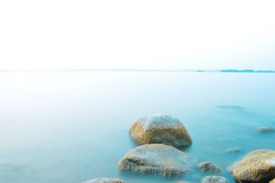 Scenic view of seascape against clear sky