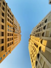 Low angle view of buildings against clear sky