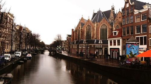 View of canal along buildings
