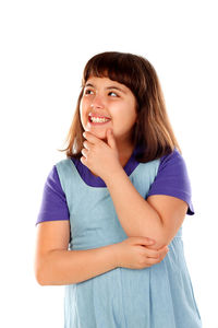 Portrait of smiling girl against white background