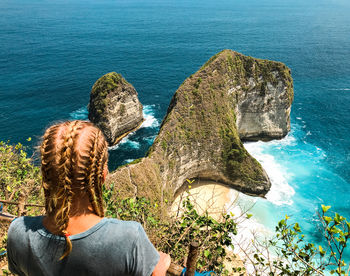 Rear view of woman looking at sea