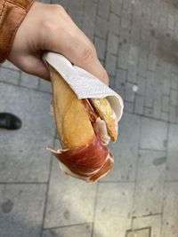 Close-up of hand holding ice cream