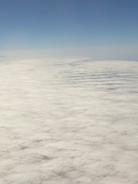 Scenic view of sea against blue sky