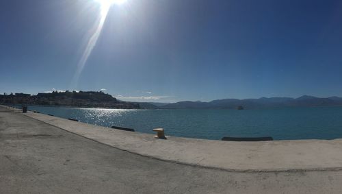 Scenic view of beach against clear sky