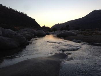 Scenic view of river and mountains