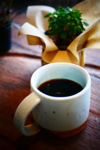 Close-up of coffee cup on table