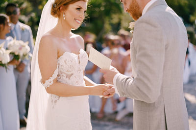 Portrait of couple holding hands