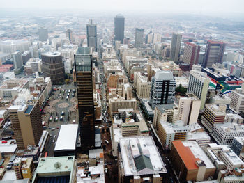 High angle view of modern buildings in city