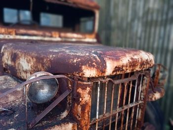 Close-up of rusty car on snow