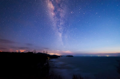 Scenic view of sea against sky at night