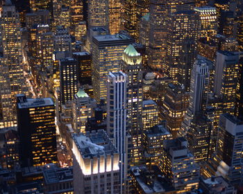 Aerial view of illuminated cityscape at night