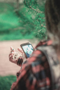 Man photographing through smart phone