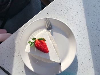 High angle view of strawberries in plate