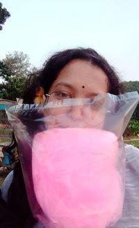 Portrait of woman drinking drink