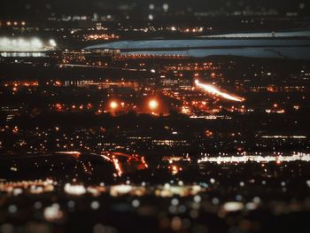 View of illuminated city at night