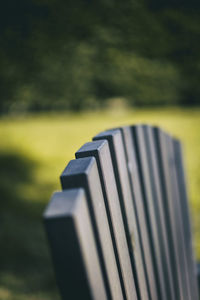 Close-up of metal grate on field