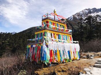 Multi colored built structure against sky