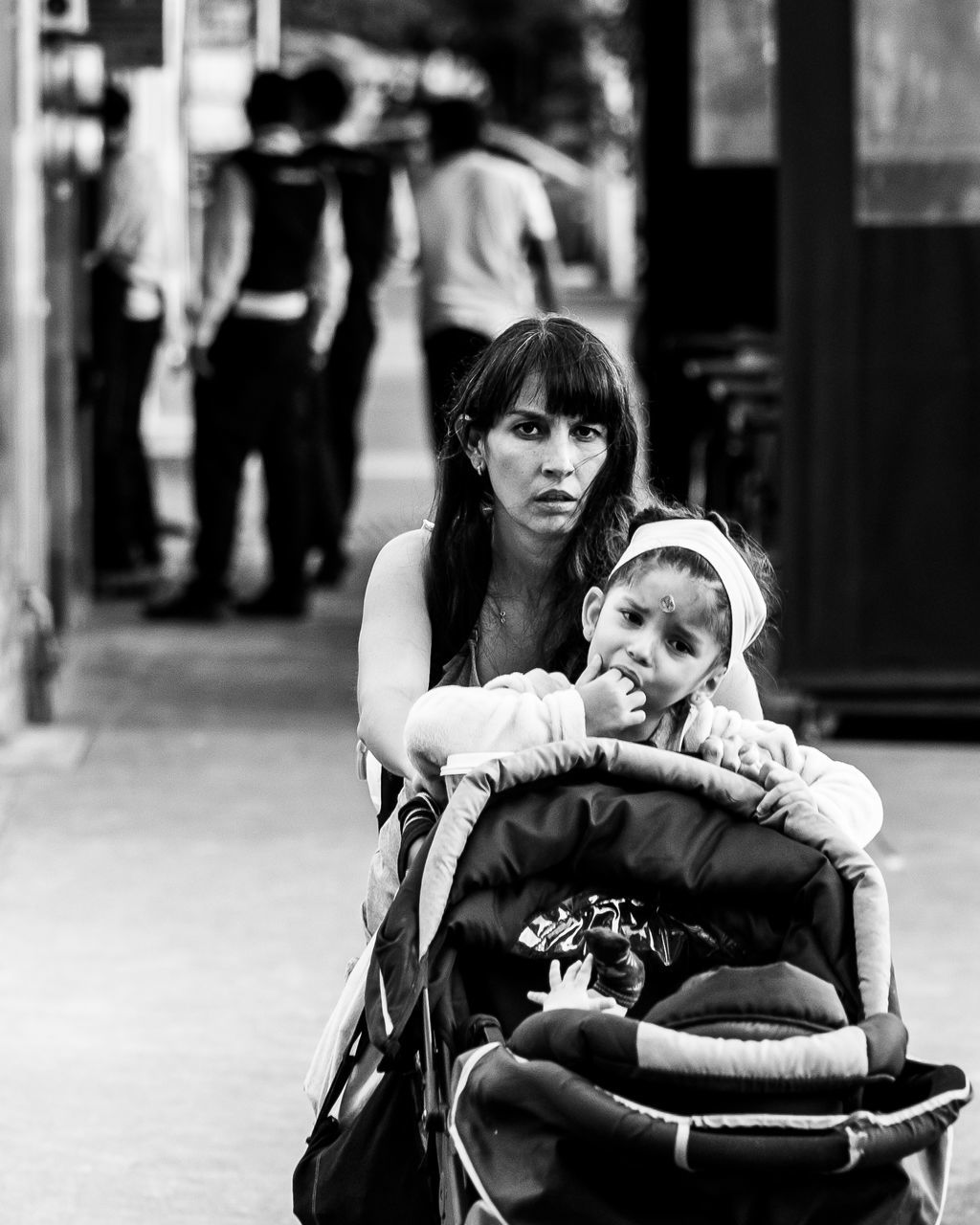 women, two people, real people, lifestyles, child, sitting, females, portrait, togetherness, focus on foreground, leisure activity, family, looking at camera, childhood, parent, people, adult, love, front view, men, daughter, son