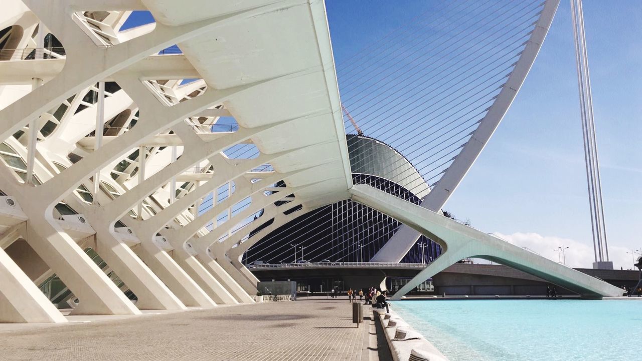 LOW ANGLE VIEW OF BRIDGE IN WATER