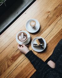 High angle view of coffee cup on table