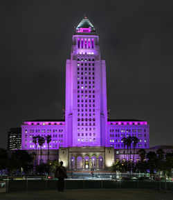 Low angle view of illuminated building at night