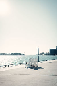 Scenic view of beach against clear sky