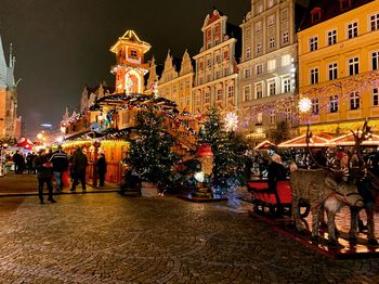 Group of people in city at night