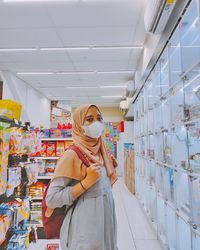 Woman standing in store