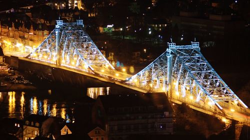 View of illuminated city at night