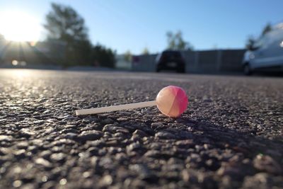 Close-up of lollipop on road