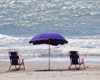 Deck chairs on beach