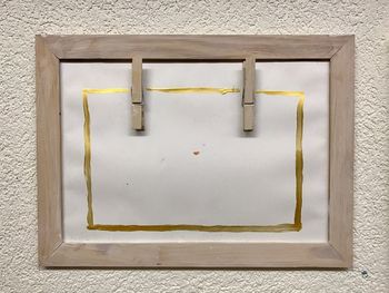 Clothes hanging on wall