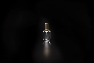 Close-up of light bulb on table