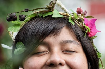 Close-up of girl with flowers