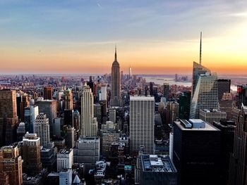 High angle view of city at sunset