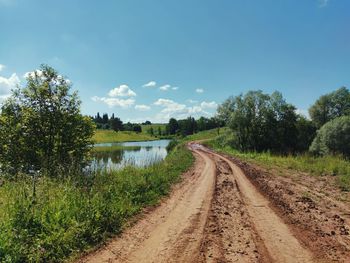 Winding road near the lake on a sunny day