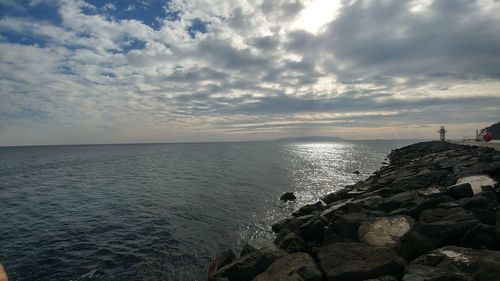 Scenic view of sea against sky during sunset