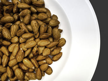 High angle view of roasted coffee in bowl on table