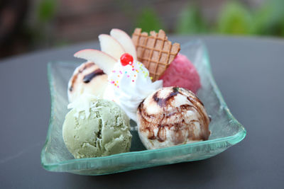 Close-up of ice cream cone on table