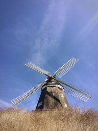 Typican windmill from below with blue sky