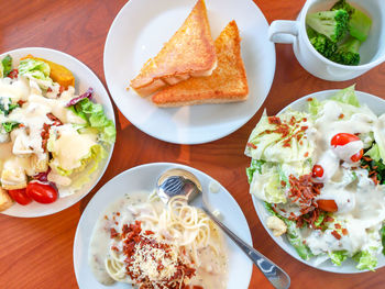 High angle view of breakfast served on table