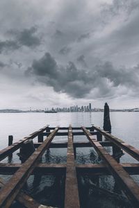 Pier over sea against sky