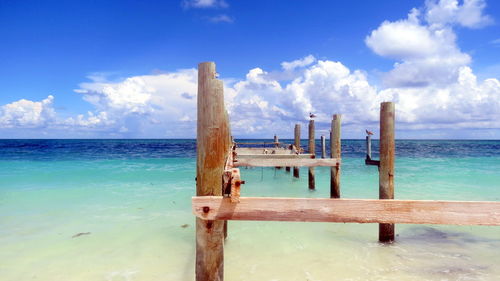 Scenic view of sea against blue sky