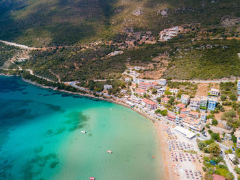 High angle view of townscape by sea