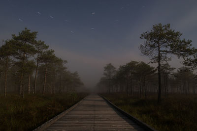 Scenic view of landscape against sky at night