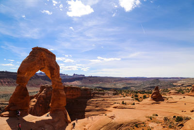 Rock formations on landscape against sky