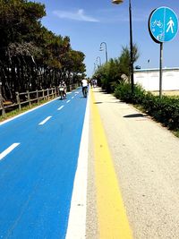 Empty road against clear sky