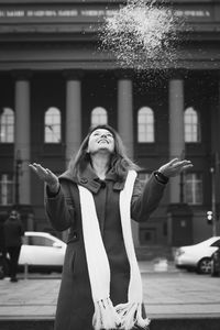 Close up person throwing snow monochrome portrait picture