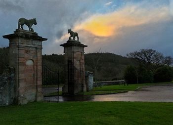 Built structure against cloudy sky