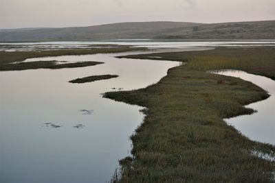 Scenic view of lake against sky